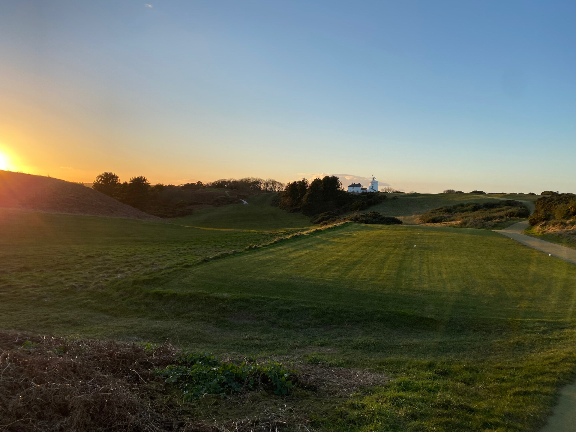 Sunset over Hunstanton golf course with the old lighthouse beyond