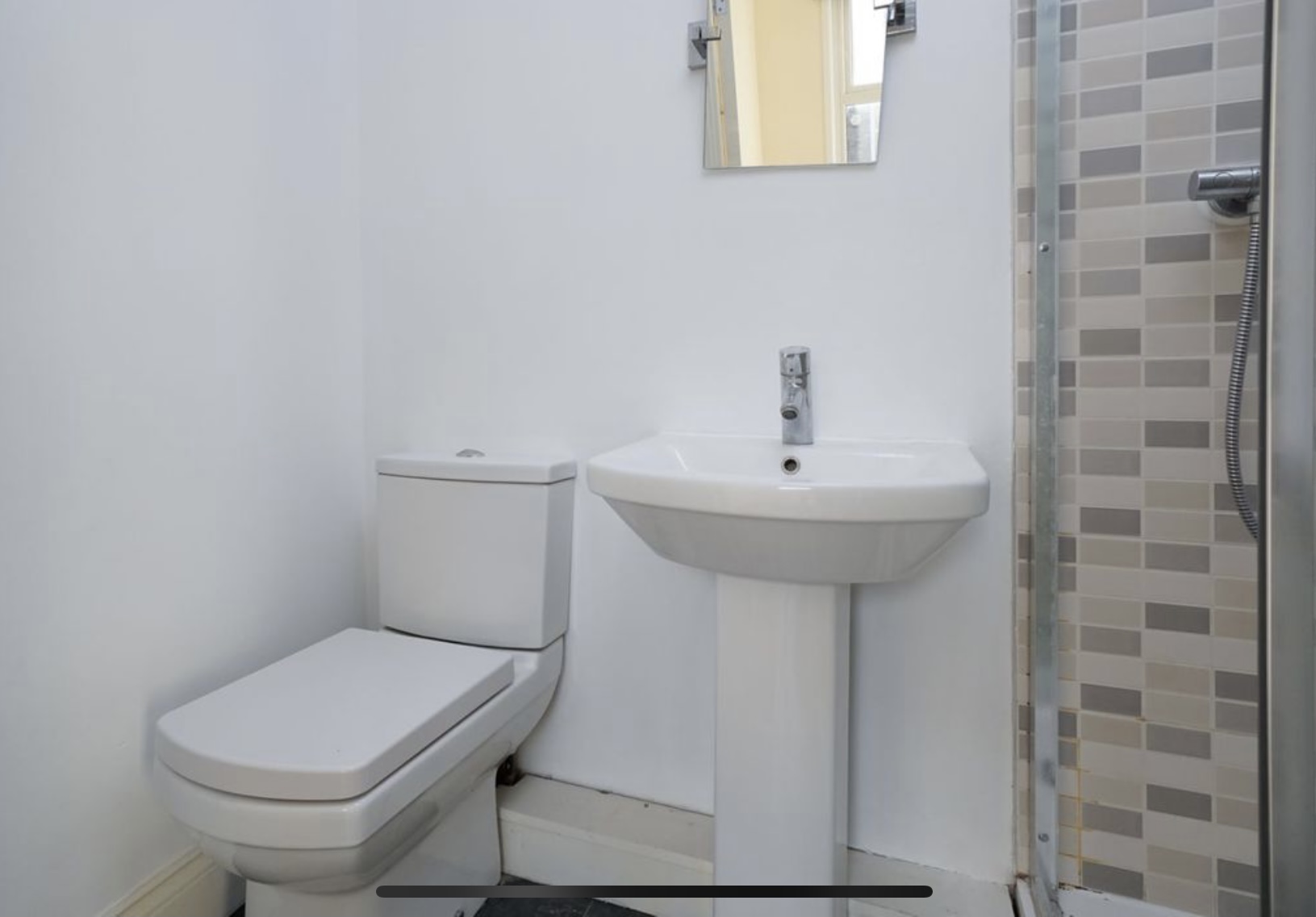 Bathroom sink and shower